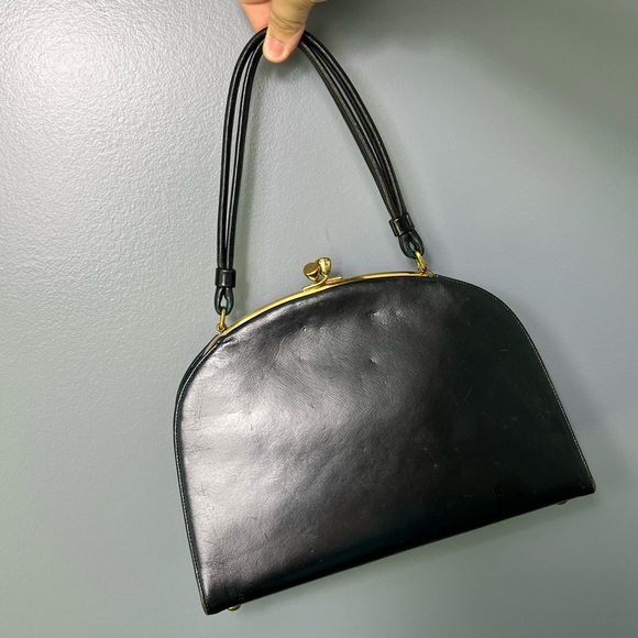 Handbags - Vintage black leather handbag with gold hardware